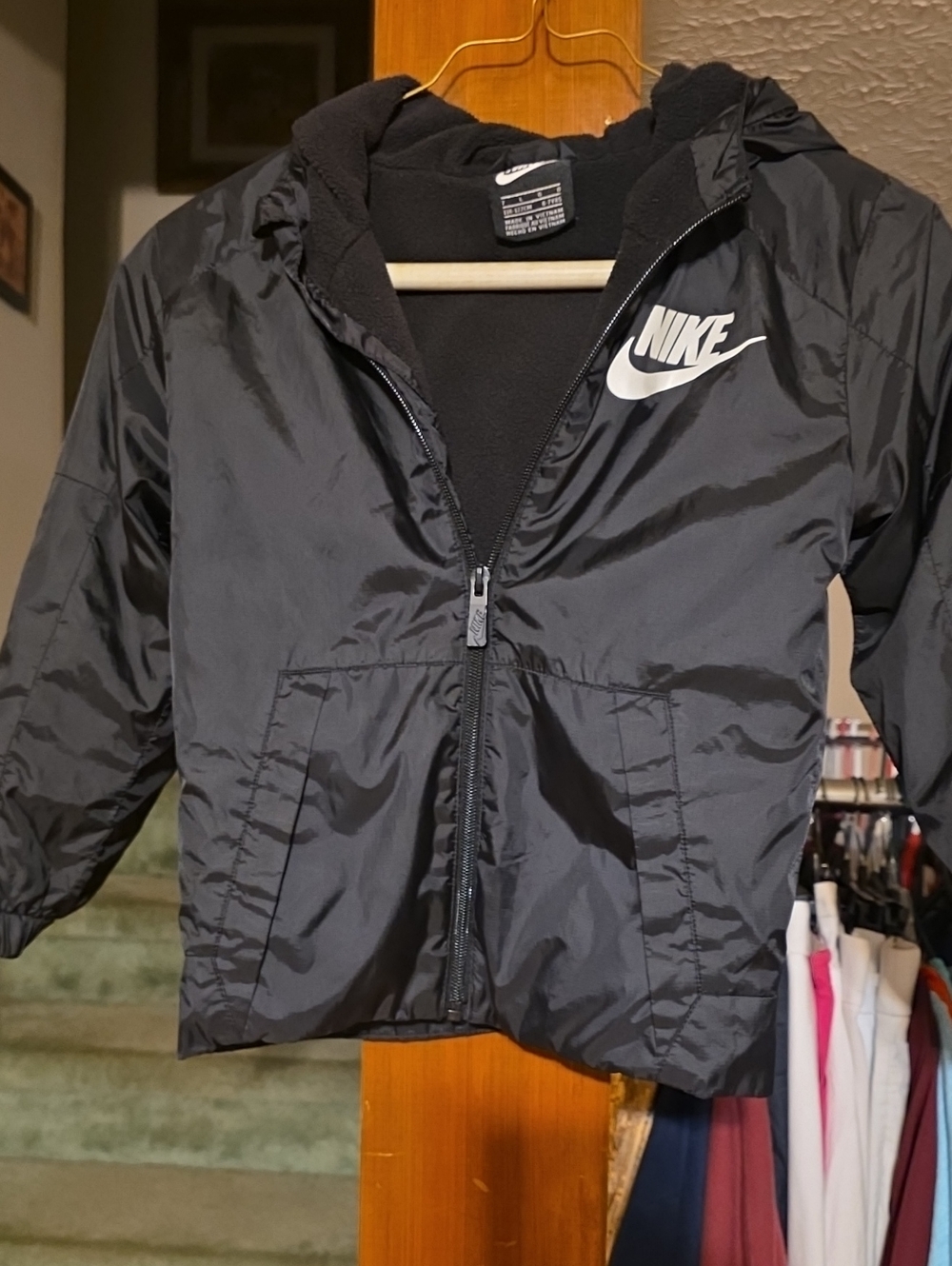 Nike Black Jacket with White Swoosh Logo